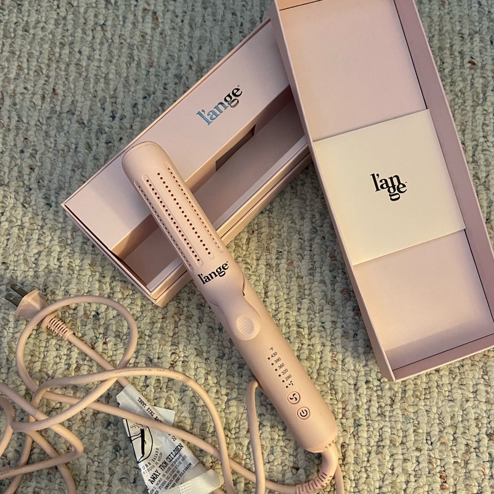 Le Duo Duel-Purpose Air Styler barley used. Almost new , works perfect !